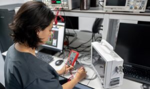 Maintenance engineer repairing medical equipment